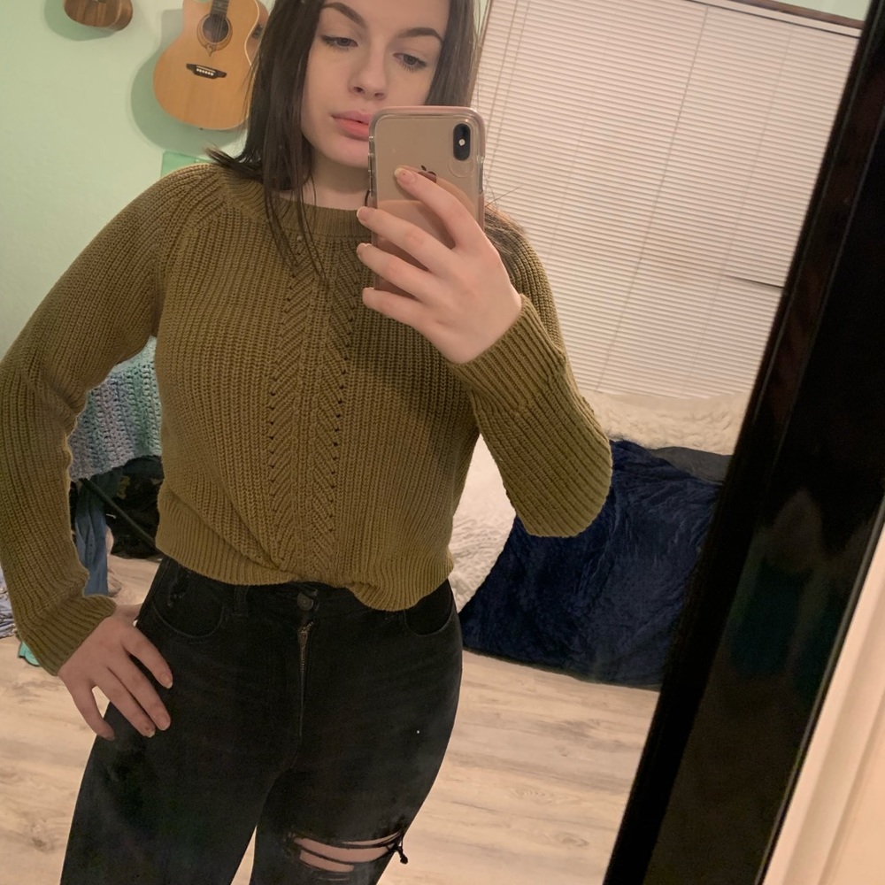 Green knitted sweater